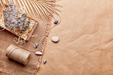 Natural aesthetic eco-friendly, sustainable background with Natural Cotton Thread, tree bark,...