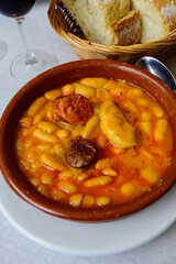Fabada asturiana, Asturian bean stew, Spain, or a red wine, made with fabes de la Granja large white beans, shoulder pork, pancetta or bacon, morcilla blood sausage, chorizo