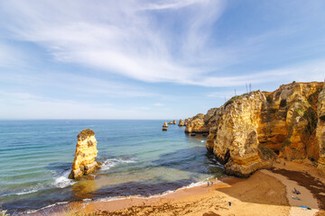 Algarve Beach with rocks and cliffs - Portuguese coastline