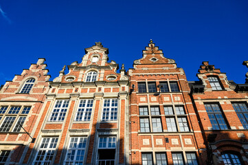 Fototapeta na wymiar Historic buildings in city centre in Belgium. Architecture.