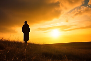 Fototapeta premium Silhouette of young free man open both arms praying in sunset, generative AI
