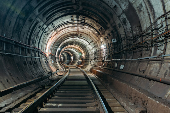 Round underground subway tunnel with tubing © Mulderphoto