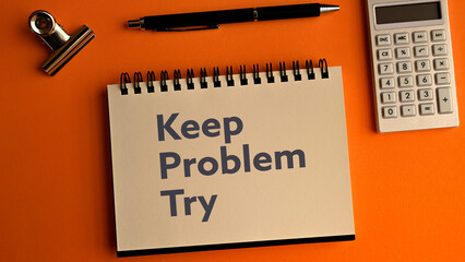 There is notebook with the word KPT. It is an abbreviation for Keep, Problem, Try as eye-catching image.