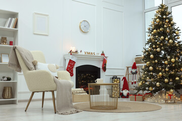 Fototapeta na wymiar Living room interior with beautiful Christmas tree and festive decor