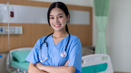 Young attractive female doctor greets her patient with happy face in front of her clinic