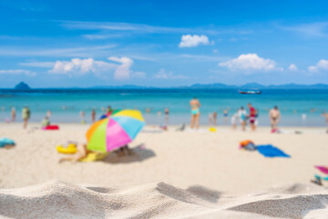 Beautiful white sand beach and Blurred crowd of people background, Summer vacation concept and copy space