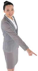 Digital png photo of happy asian businesswoman pointing down on transparent background