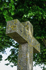 stone cross on a cemetery