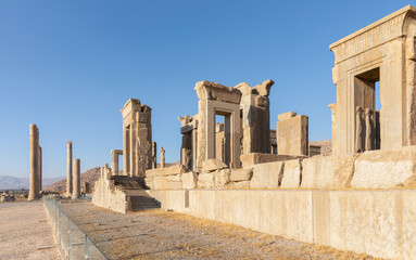 Ruins of Tachara on right and Apadana on far left in Persepolis, founded by Darius the Great in 518 BC and capital of ancient Achaemenid Empire, 60 km northeast of Shiraz, Iran. UNESCO World Heritage.
