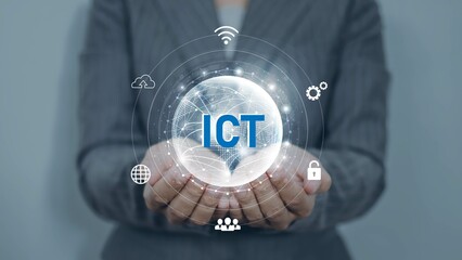Businesswoman touching on mobile and Computer Information and communication technology(ICT) concept.Information and communication technology .Wireless communication network. Intelligent system 
