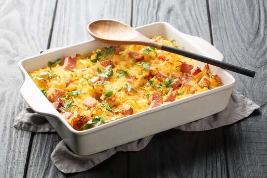 Austrian Baked Ham, Cheese, and Noodle Casserole closeup on the baking dish on the table. Horizontal
