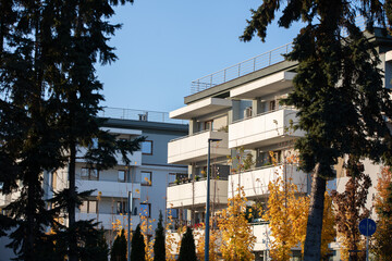 View at sunset in autumn on modern residential buildings.