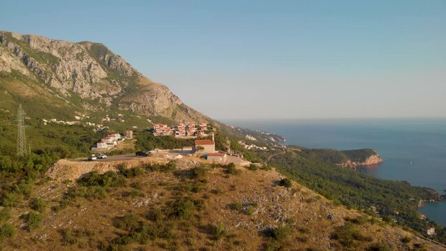 Lowering On The Medieval-Built Church Of St. Sava In Montenegro, Balkans, Adriatic Sea, Europe. Aerial Tilt-down
