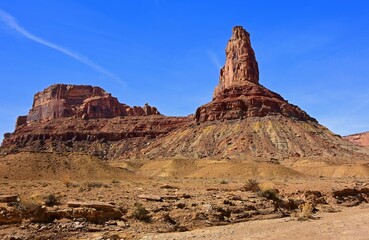 colorful red rock formations  and bottleneck peak  on a sunny winter day  along the buckhorn draw scenic backway in the northern san rafael swell near green river,  utah 
