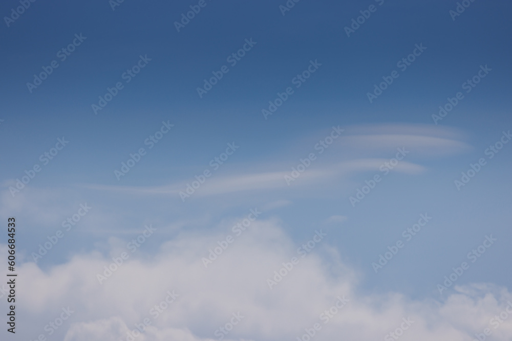 Wall mural curve cloud texture with blue sky background. cloud and blue sky in summer time.