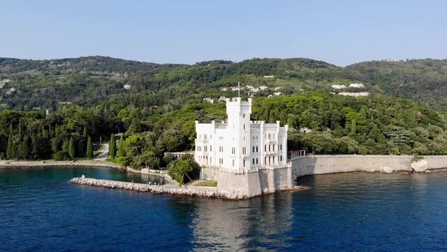 Castello di Miramare captured by drone flying backwards