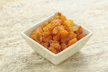 Sweet yellow raisin in the bowl