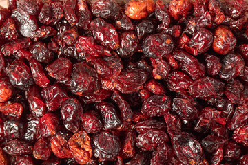 Dried Cranberry. Organic farm products. Sun dried cranberry background. Top view