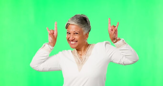 Rock gesture, face and woman in green screen, funny hands or emoji for winning, success or celebration, Excited, crazy and fun senior, indian person dancing or celebrate isolated on studio background