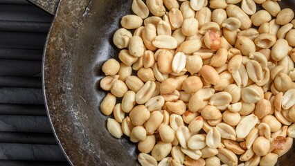 Savory Temptation: Close-Up of Roasted and Salted Peanuts, Showcasing Irresistible Crunchiness in Stunning 4K Ultra HD Resolution