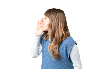 Young girl over isolated chroma key background shouting with mouth wide open to the side