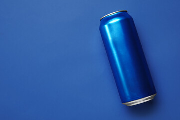 Can of soda on blue background