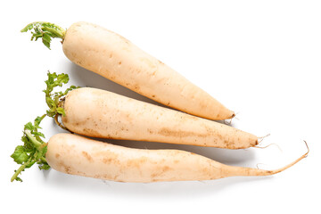 Fresh daikon radishes on white background