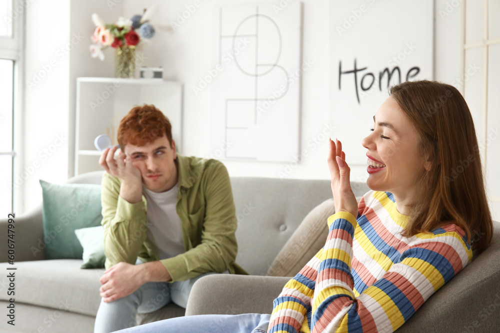 Canvas Prints Laughing young woman get proposed at home