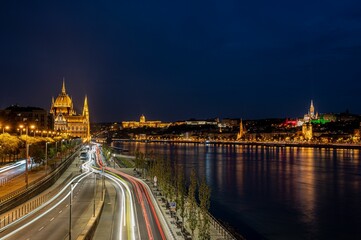 Aerial long exposure view of a road with light trails at night in Budapest, Hungary