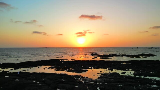 sunset view from the beach closeup to wide view in gorai  beach in mumbai