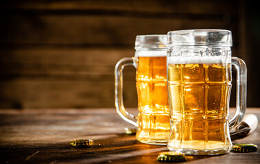 Glasses with fresh beer. - 606757727