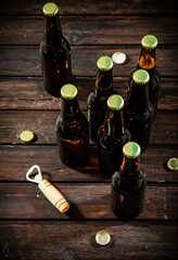 Bottles with beer and opener.