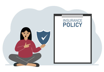 A woman holds an insurance policy sign in his hands. The concept of life insurance, property or natural disasters.