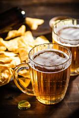 Fresh beer with corn chips.