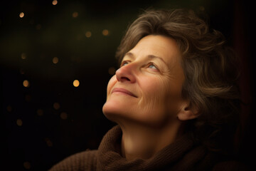 Portrait of a happy senior woman on a background of bokeh