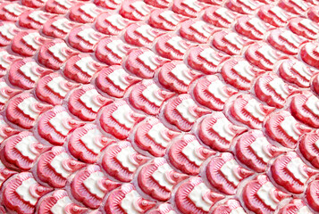 Art seamless patterns of pink serpent scale skin in temple background