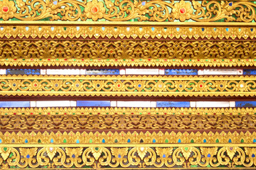 Thai pattern pattern on the Thai temple wall or kanok pattern wall for temple.