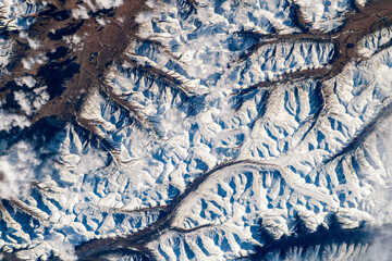 Land and snow landscape. Digital enhancement. Elements by NASA