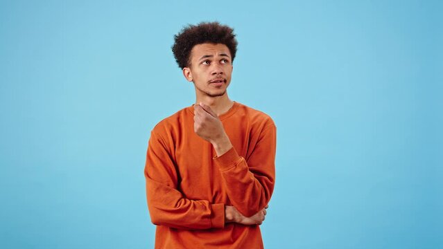 Confused man considers way out of difficult situation