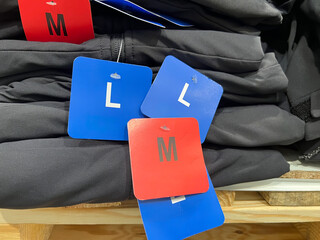 Shirt clothing variety size tag at a department store