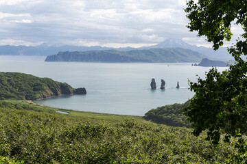 Three Brothers is a famous landmark in the Avacha Bay. Kamchatka Peninsula, Russia