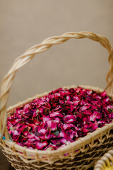 beautiful colourful petals in basket 