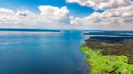 Dnipro river and green meadows aerial view from above, Dnieper river spring landscape, Ukraine
