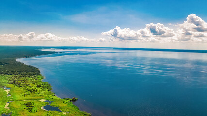 Dnipro river and green meadows aerial view from above, Dnieper river spring landscape, Ukraine
