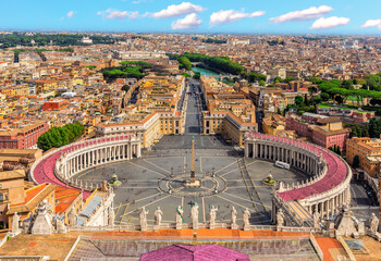 Vatican skyline view and statues on the top of St Peter's Basilica, Rome, Italy