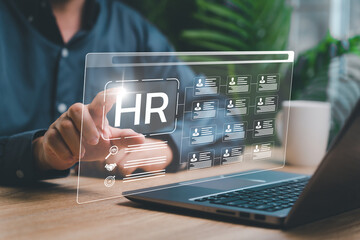 Human resources technology modern technologies for simplifying human resources system concept, Businessman management  Human resources, and check data person management in the organization effectively