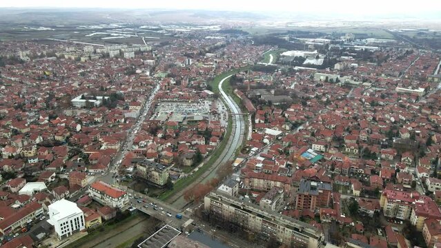 Aerial landscape footage of Leskovac, city in south Serbia, winter time.