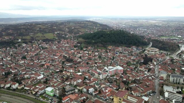 Aerial landscape footage of Leskovac, city in south Serbia, winter time.