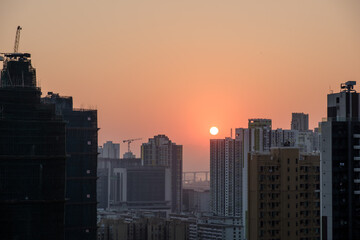 Fototapeta na wymiar The sunset in Kowloon, under the Garden Hill in Sham Shui Po, Hong Kong.