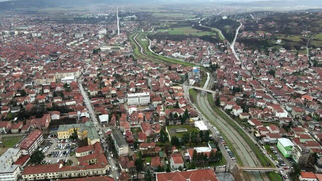 Aerial landscape footage of Leskovac, city in south Serbia, winter time.